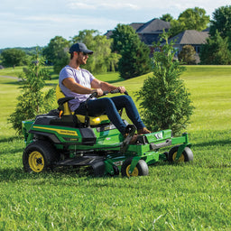 John Deere Z320R mowing a large field