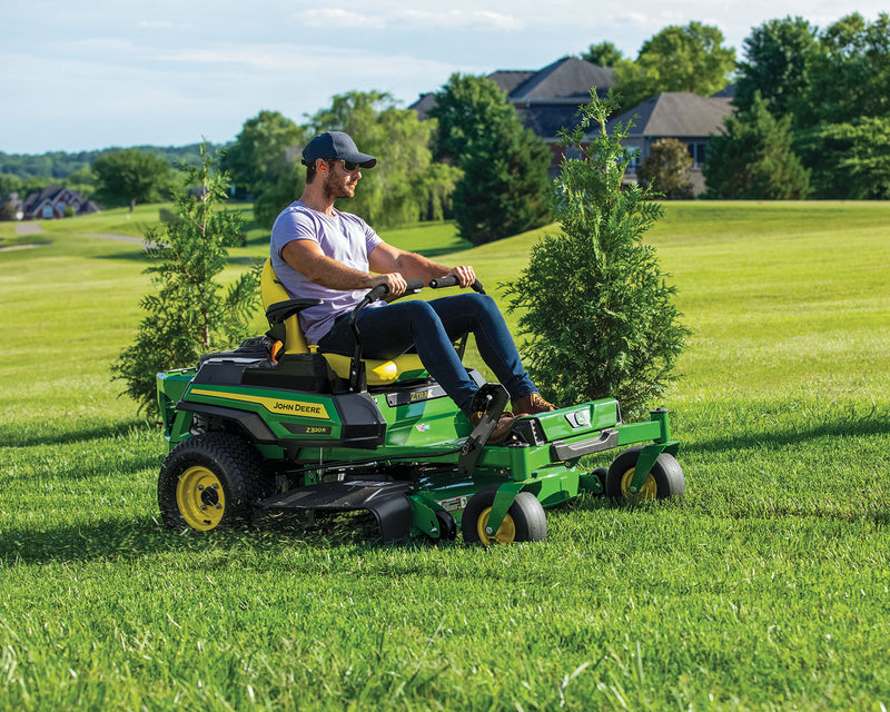 John Deere Z320R mowing a large field