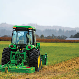 4R Series Utility Tractor Mowing