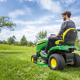 X370 mowing a garden