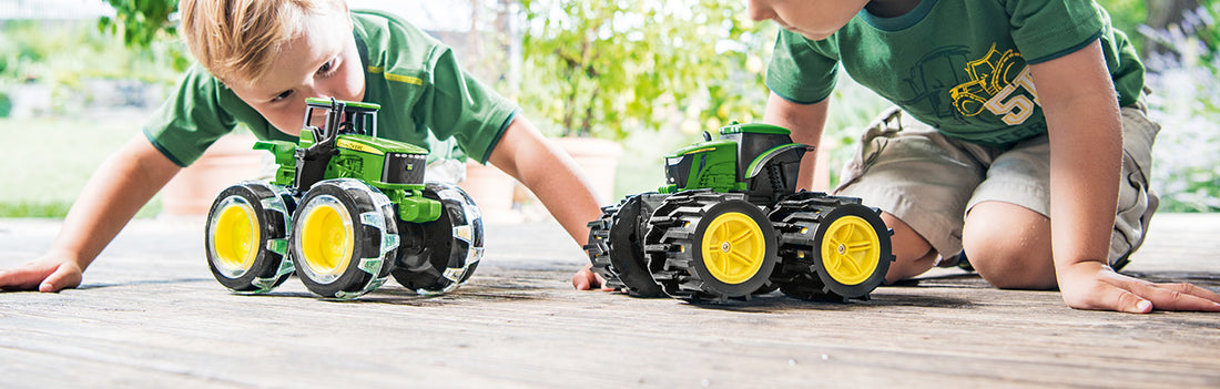 Children with toy tractors