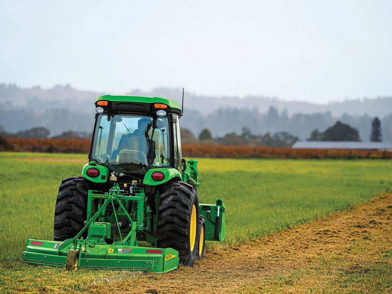 4R Series Utility Tractor Mowing