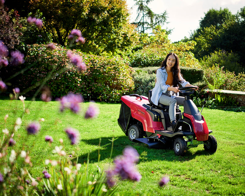 Red ride on lawn mower