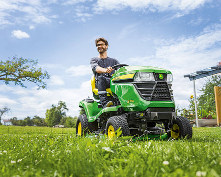 Man mowing with X370